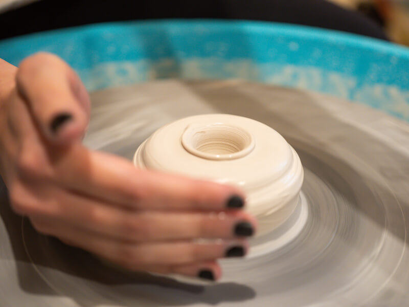 Wheel throwing pottery